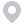 A light gray map pin icon with a circular hole in the center, indicating a location marker.