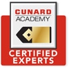 A white and red badge with "CUNARD ACADEMY" above a gold and black captain's stripe, and "CERTIFIED EXPERTS" below.